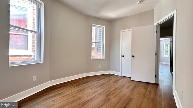 5841 Cedarhurst St, Philadelphia, PA 19143 - unfurnished bedroom featuring wood finished floors