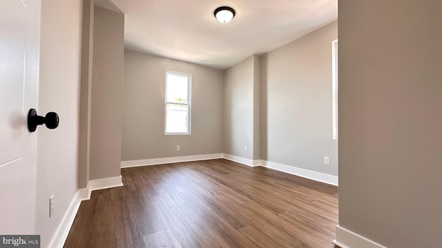5841 Cedarhurst St, Philadelphia, PA 19143 - unfurnished room featuring dark wood finished floors and baseboards