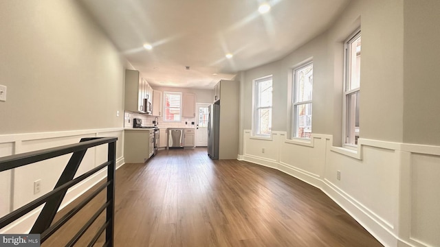 5841 Cedarhurst St, Philadelphia, PA 19143 - unfurnished living room featuring recessed lighting and dark wood-style flooring
