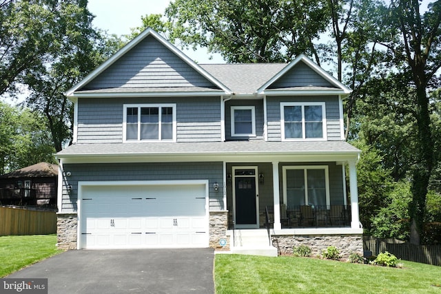 207 Beverley Ave, Edgewater, MD 21037 - craftsman house with asphalt driveway, an attached garage, covered porch, and a shingled roof