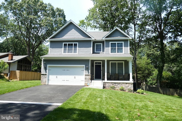 207 Beverley Ave, Edgewater, MD 21037 - craftsman-style home featuring driveway, an attached garage, a porch, and stone siding
