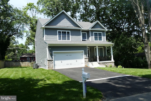 207 Beverley Ave, Edgewater, MD 21037 - craftsman-style home with driveway, a porch, a garage, and stone siding