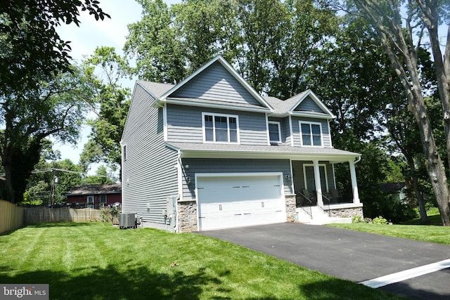 207 Beverley Ave, Edgewater, MD 21037 - craftsman house featuring driveway, a garage, a porch, and stone siding