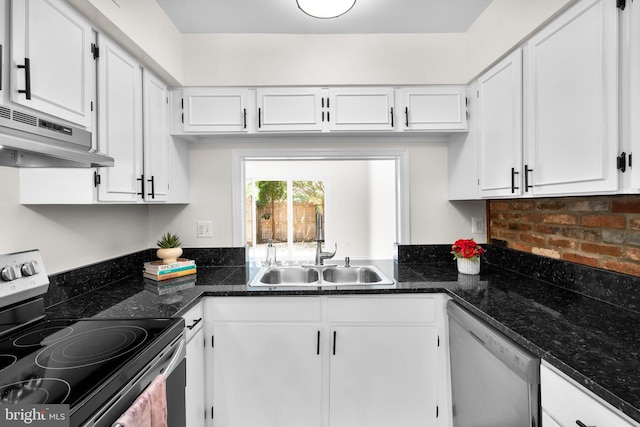 8384 Forrester Blvd, Springfield, VA 22152 - kitchen with appliances with stainless steel finishes, under cabinet range hood, white cabinetry, and dark stone counters