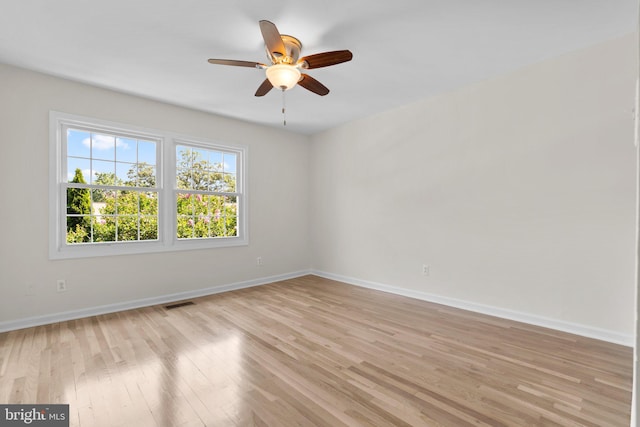 8384 Forrester Blvd, Springfield, VA 22152 - spare room with light wood finished floors and a ceiling fan
