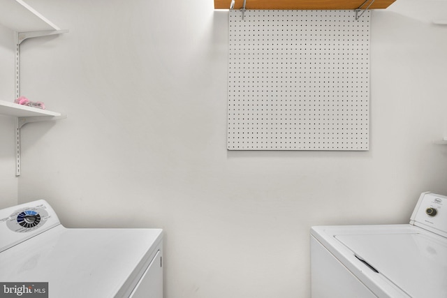 8384 Forrester Blvd, Springfield, VA 22152 - laundry room with washing machine and clothes dryer