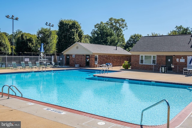 8384 Forrester Blvd, Springfield, VA 22152 - community pool featuring a patio