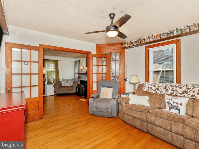 21127 Twin Springs Dr, Smithsburg, MD 21783 - living area with wood finished floors, ceiling fan, and healthy amount of natural light