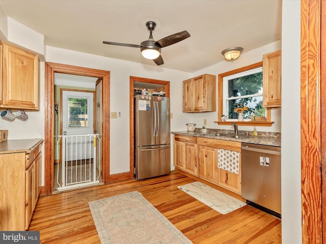 21127 Twin Springs Dr, Smithsburg, MD 21783 - kitchen featuring stainless steel appliances, light wood-style flooring, healthy amount of natural light, and a ceiling fan