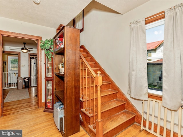 21127 Twin Springs Dr, Smithsburg, MD 21783 - stairway with wood finished floors and ceiling fan