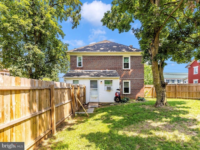 21127 Twin Springs Dr, Smithsburg, MD 21783 - rear view of house featuring brick siding, a fenced backyard, cooling unit, and roof with shingles