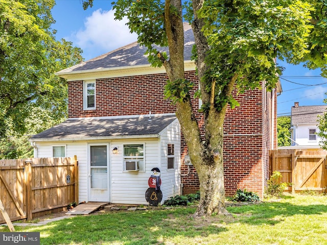 21127 Twin Springs Dr, Smithsburg, MD 21783 - back of house featuring a shingled roof, brick siding, and cooling unit