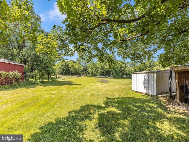 21127 Twin Springs Dr, Smithsburg, MD 21783 - view of green lawn with a shed