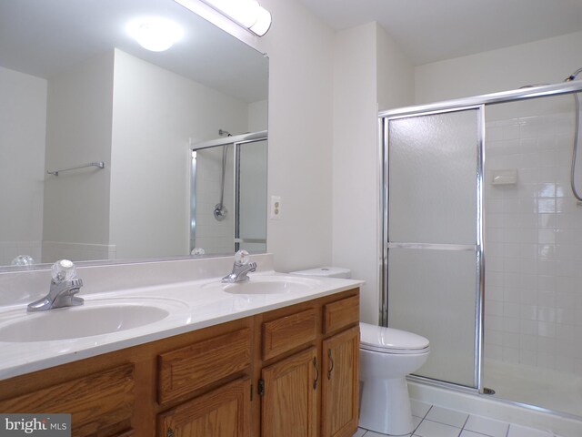 44035 Kings Arms Sq, Ashburn, VA 20147 - full bath with a stall shower, double vanity, and tile patterned flooring