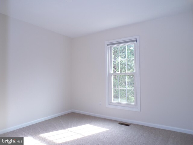 44035 Kings Arms Sq, Ashburn, VA 20147 - carpeted spare room featuring baseboards