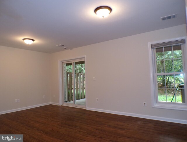 44035 Kings Arms Sq, Ashburn, VA 20147 - spare room featuring healthy amount of natural light and dark wood-style flooring