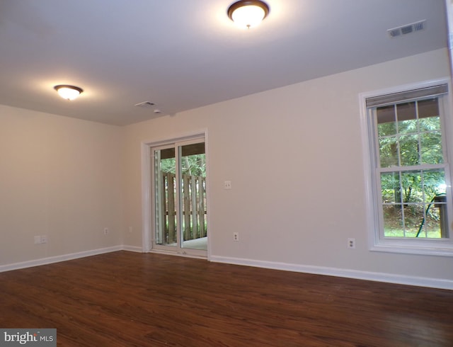 44035 Kings Arms Sq, Ashburn, VA 20147 - unfurnished room featuring dark wood-style flooring and plenty of natural light