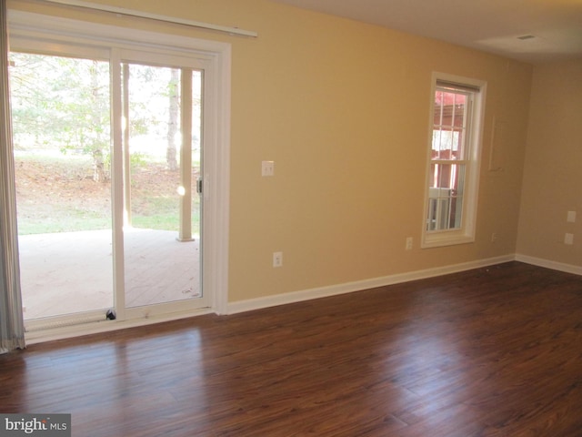 44035 Kings Arms Sq, Ashburn, VA 20147 - unfurnished room with plenty of natural light and dark wood-type flooring