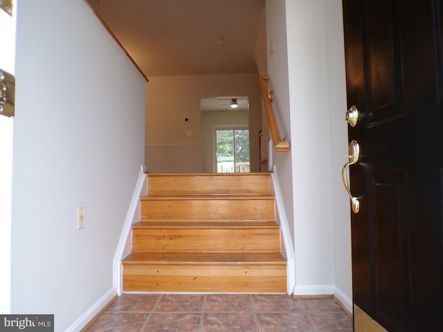 44035 Kings Arms Sq, Ashburn, VA 20147 - stairs featuring tile patterned flooring and crown molding