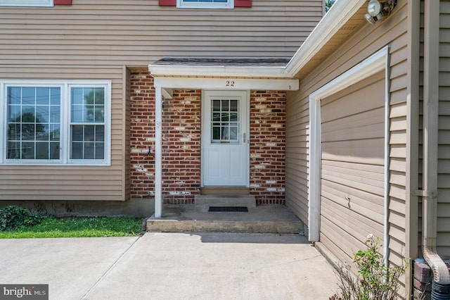 22 Clemson Rd, Cherry Hill, NJ 08034 - doorway to property featuring brick siding