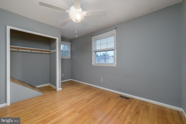 22 Clemson Rd, Cherry Hill, NJ 08034 - unfurnished bedroom with a closet, wood finished floors, and a ceiling fan