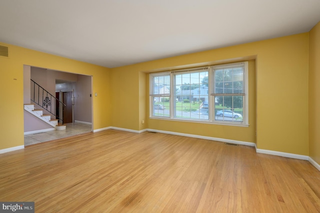 22 Clemson Rd, Cherry Hill, NJ 08034 - unfurnished room featuring wood finished floors and stairs