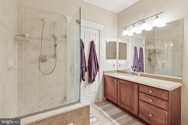 300 W Elm St Unit 2104, Conshohocken, PA 19428 - bathroom with a shower stall, vanity, and tile patterned floors