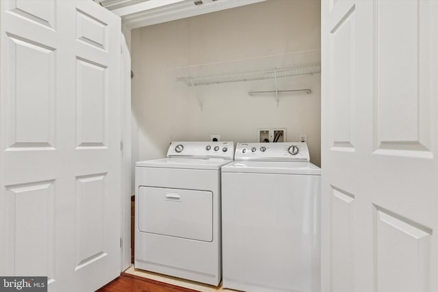 300 W Elm St Unit 2104, Conshohocken, PA 19428 - laundry room with washing machine and dryer and wood finished floors