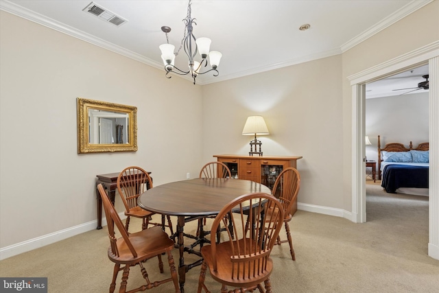 300 W Elm St Unit 2104, Conshohocken, PA 19428 - dining area featuring light carpet, ornamental molding, a chandelier, and ceiling fan