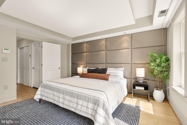 2431 Ontario Rd NW Unit 4, Washington, DC 20009 - bedroom featuring light wood-type flooring and baseboards