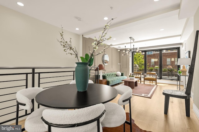 2431 Ontario Rd NW Unit 4, Washington, DC 20009 - dining space featuring recessed lighting, wood finished floors, and a chandelier