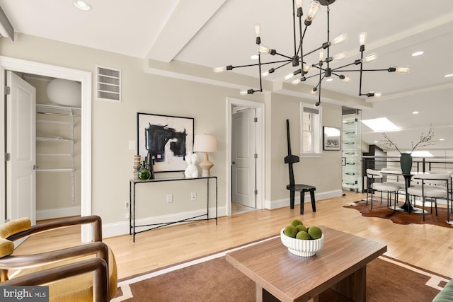 2431 Ontario Rd NW Unit 4, Washington, DC 20009 - living room featuring a chandelier, light wood-style flooring, and recessed lighting