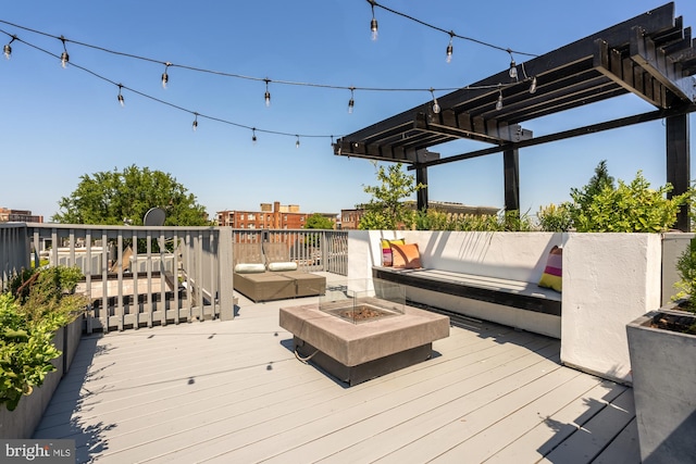 2431 Ontario Rd NW Unit 4, Washington, DC 20009 - deck with a pergola and an outdoor living space with a fire pit