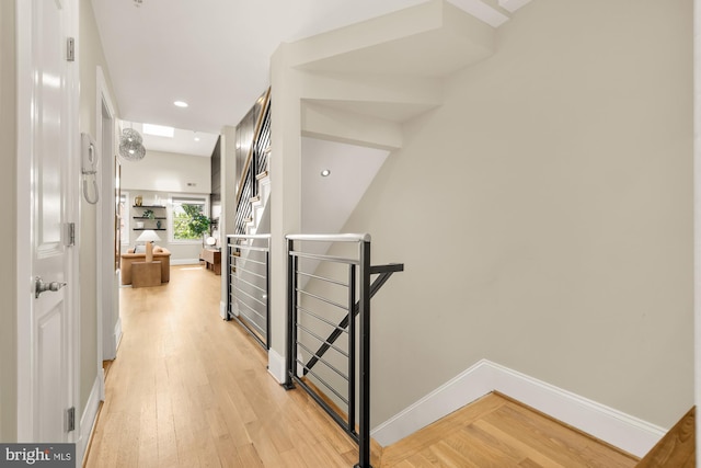 2431 Ontario Rd NW Unit 4, Washington, DC 20009 - corridor with an upstairs landing, light wood-style flooring, and recessed lighting