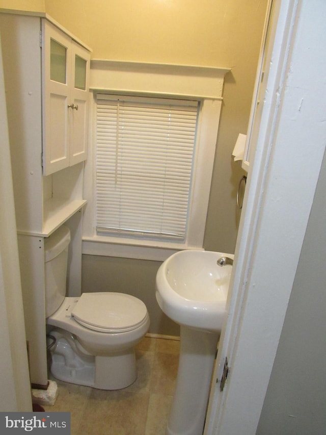 410 Hanover Rd, York, PA 17408 - half bath with toilet and tile patterned floors