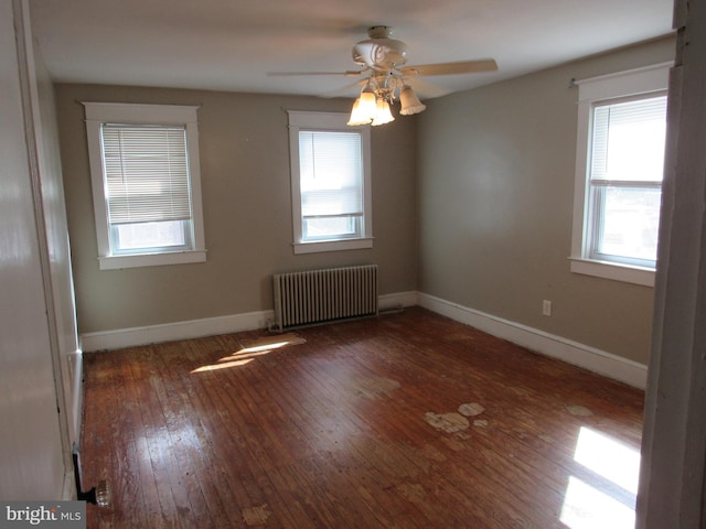410 Hanover Rd, York, PA 17408 - spare room with radiator, hardwood / wood-style floors, and a ceiling fan