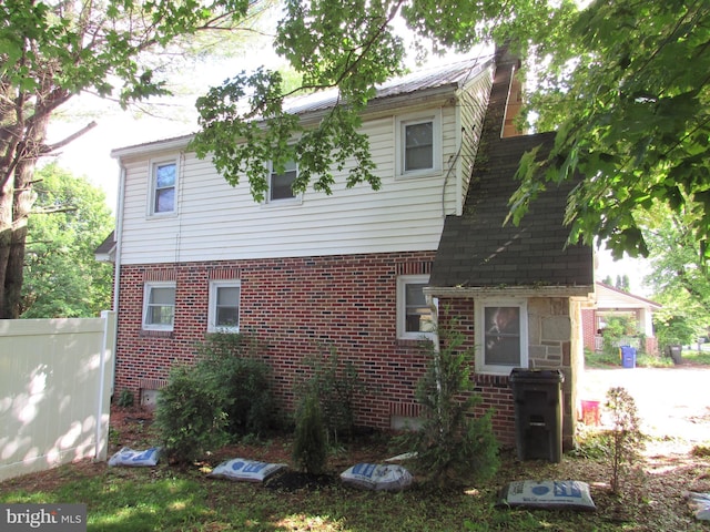 410 Hanover Rd, York, PA 17408 - view of front of house featuring brick siding and a chimney