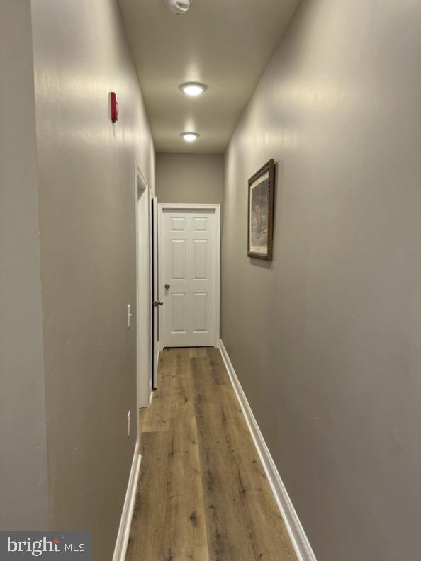 2647 N 17th St, Philadelphia, PA 19132 - hallway featuring wood finished floors and baseboards
