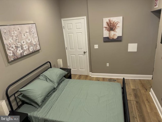 2647 N 17th St, Philadelphia, PA 19132 - bedroom featuring wood finished floors and baseboards