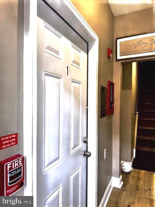 2647 N 17th St, Philadelphia, PA 19132 - entrance foyer with wood finished floors and stairs