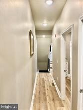 2647 N 17th St, Philadelphia, PA 19132 - corridor with wood finished floors and baseboards