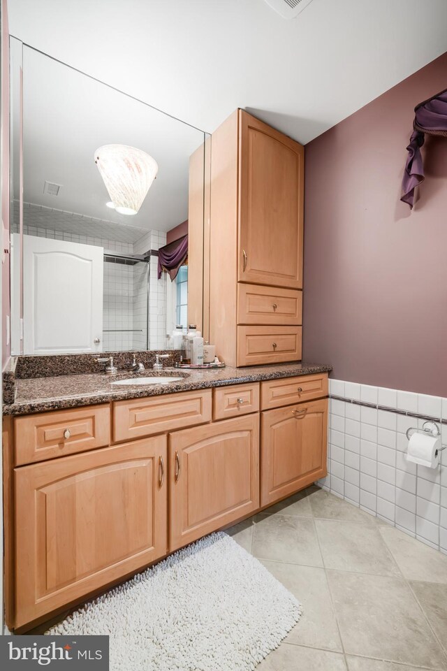 1126 Timbergate Dr, Jenkintown, PA 19046 - bathroom featuring tile walls, tile patterned flooring, a shower, vanity, and wainscoting