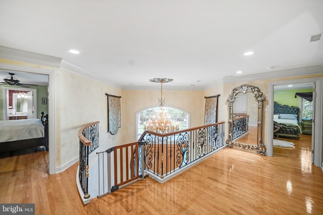1126 Timbergate Dr, Jenkintown, PA 19046 - corridor with an upstairs landing, a chandelier, wood finished floors, crown molding, and recessed lighting