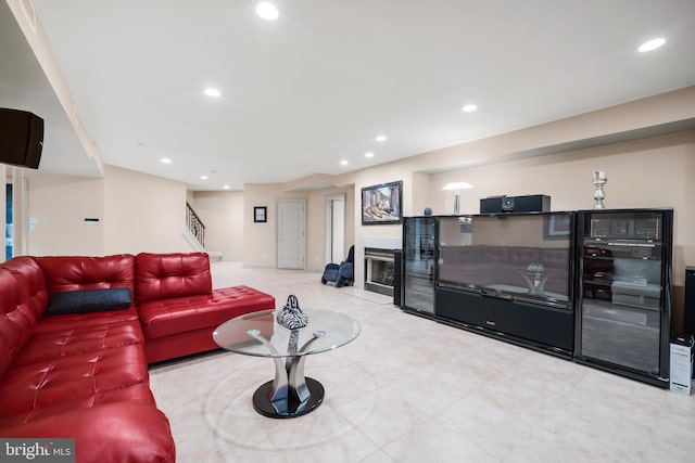 1126 Timbergate Dr, Jenkintown, PA 19046 - living room featuring stairway, recessed lighting, a glass covered fireplace, and tile patterned floors