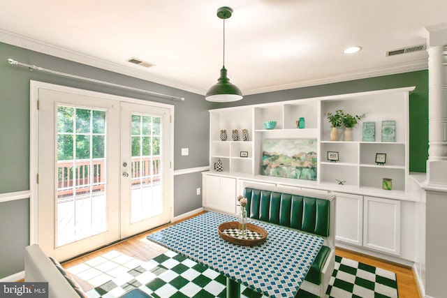 5722 Larpin Ln, Alexandria, VA 22310 - dining room featuring french doors, crown molding, light wood-style floors, and recessed lighting