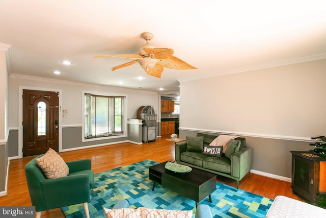 5722 Larpin Ln, Alexandria, VA 22310 - living room with light wood-style flooring, ornamental molding, a ceiling fan, and recessed lighting