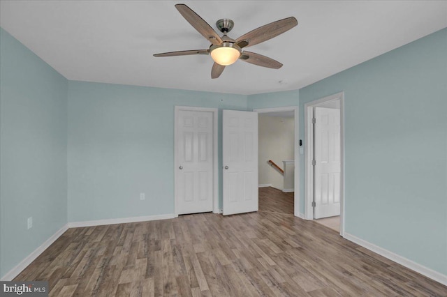 284 S Village Cir, Palmyra, PA 17078 - unfurnished bedroom with wood finished floors and a ceiling fan