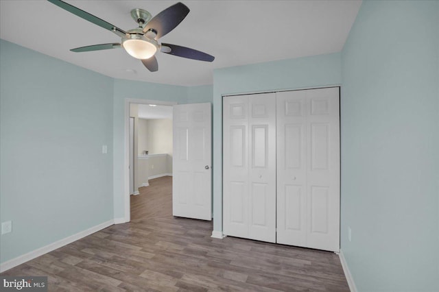 284 S Village Cir, Palmyra, PA 17078 - unfurnished bedroom with wood finished floors, a closet, and a ceiling fan
