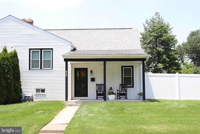 848 Grakyn Ln, Philadelphia, PA 19128 - view of front of property featuring roof with shingles, covered porch, and a chimney