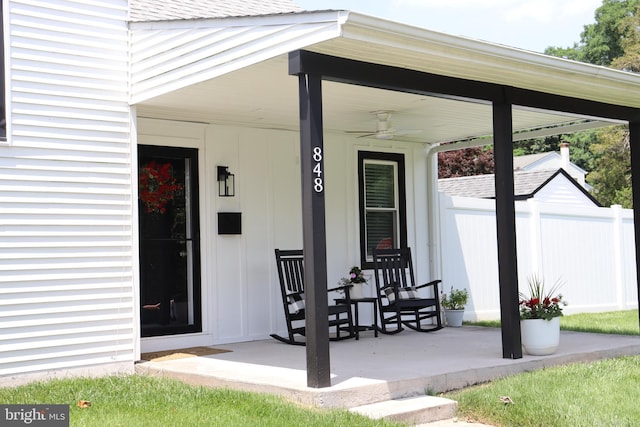 848 Grakyn Ln, Philadelphia, PA 19128 - entrance to property featuring a porch, a shingled roof, board and batten siding, and a ceiling fan